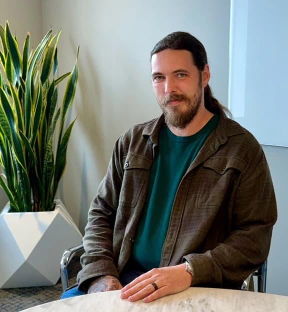 Headshot of Daniel Austi, Project Manager