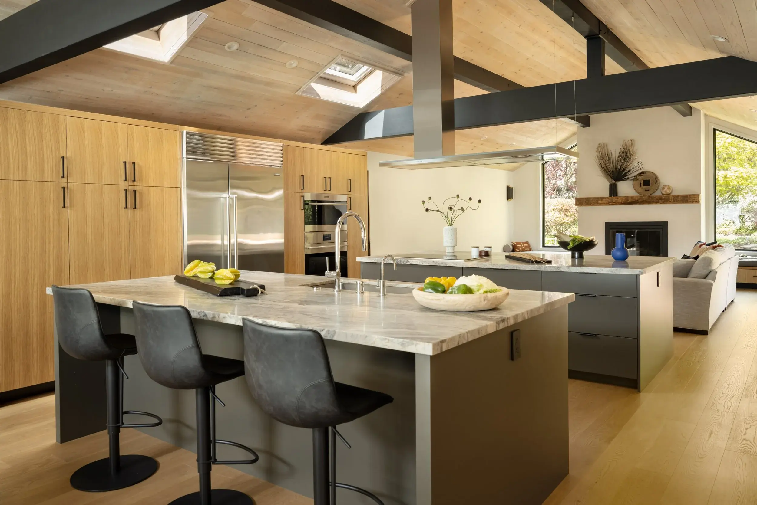 Kitchen with quartz counter top and brown cabinets